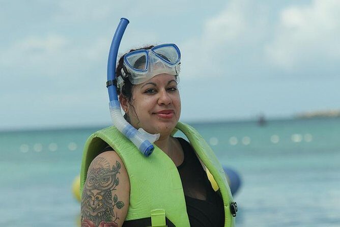 Bahama Kayak Full Day Water Sports Package at Junkanoo Beach - Beach chairs, umbrellas, and the food reality