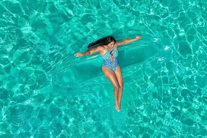 Clear Kayak Photoshoot in Nassau ,Bahamas. - Entering C.S. Watersports on Junkanoo Beach