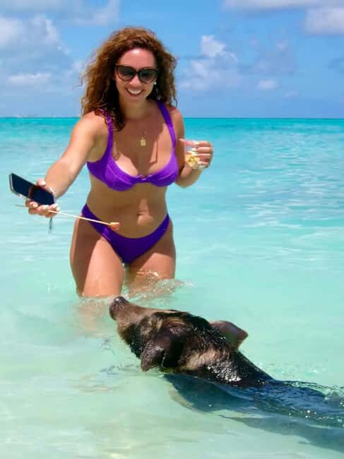 Nassau: Swimming Pigs and Private Beach Club Trip with Lunch - The pig encounter: feeding, petting, and shallow-water fun